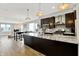 Spacious kitchen featuring granite countertops, modern appliances, and an open layout at 622 E 10Th St # 312, Indianapolis, IN 46202