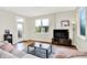 Cozy living area with large windows, modern decor, and hardwood flooring at 622 E 10Th St # 312, Indianapolis, IN 46202