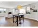 Bright living room with hardwood floors, large windows, and modern furnishings at 622 E 10Th St # 312, Indianapolis, IN 46202