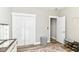 Bedroom featuring wood floors, double closet, and neutral walls at 6301 Prospect St, Indianapolis, IN 46203