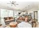 Open-concept living room with a view of the modern kitchen and dining area at 6301 Prospect St, Indianapolis, IN 46203