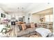 Spacious living room connected to a modern kitchen and dining area with vaulted ceilings at 6301 Prospect St, Indianapolis, IN 46203