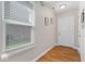 Bright foyer with hardwood floors, large window, and white trim at 6333 Pinebark Pl, Indianapolis, IN 46217