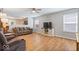 Bright living room with hardwood floors, comfortable couches, and an open layout at 6333 Pinebark Pl, Indianapolis, IN 46217