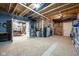 Unfinished basement with utilities, carpet, and exposed ceiling at 6784 W May Apple Dr, McCordsville, IN 46055