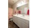 A bathroom features a double sink vanity with a decorative shower curtain at 6784 W May Apple Dr, McCordsville, IN 46055