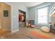 A cheerful room offers ample closet space and a comfortable beanbag chair at 6784 W May Apple Dr, McCordsville, IN 46055