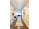 Elegant hallway featuring decorative wallpaper and stylish decor at 6784 W May Apple Dr, McCordsville, IN 46055