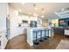 Bright, open kitchen with a large island and seating, perfect for entertaining at 6784 W May Apple Dr, McCordsville, IN 46055