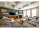 Comfortable living room with coffered ceiling, a fireplace, neutral paint, and plush seating at 6784 W May Apple Dr, McCordsville, IN 46055