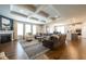 Spacious living room with fireplace, plush seating, and abundant natural light flowing into an open floor plan at 6784 W May Apple Dr, McCordsville, IN 46055