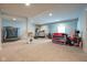 Large recreational room featuring exercise equipment, a trampoline, and a play area at 6784 W May Apple Dr, McCordsville, IN 46055