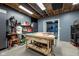 Versatile workshop featuring a work bench, tool storage, and ample workspace at 6784 W May Apple Dr, McCordsville, IN 46055