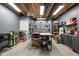 Functional workshop with pegboard walls, worktables, and a variety of tools at 6784 W May Apple Dr, McCordsville, IN 46055