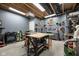 Organized workshop with slat walls, worktables, and an array of tools and equipment at 6784 W May Apple Dr, McCordsville, IN 46055
