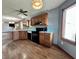 Kitchen with an oven, wood cabinets, and a window for natural light at 741 Springmill Dr, Mooresville, IN 46158