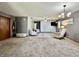 Spacious living room with comfortable seating, neutral tones, and stylish decor at 741 Springmill Dr, Mooresville, IN 46158