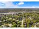 Spacious suburban neighborhood showcasing manicured lawns, lush trees, and easy access to major highways and retail areas at 742 Marana Dr, Carmel, IN 46032