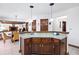 Open kitchen featuring granite countertops and view into a separate living room at 742 Marana Dr, Carmel, IN 46032