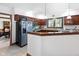 Kitchen featuring stainless appliances, granite countertops, and breakfast bar at 742 Marana Dr, Carmel, IN 46032