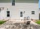 Backyard patio area, perfect for outdoor dining and relaxation. Features direct access to indoors at 7611 Penguin Cir, Indianapolis, IN 46239