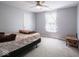 Neutral bedroom featuring a fan and a window at 7611 Penguin Cir, Indianapolis, IN 46239