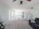 Bonus room with carpeting, and comfortable seating at 7611 Penguin Cir, Indianapolis, IN 46239
