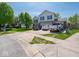 A two-story home with a driveway, landscaping, and exterior features at 7611 Penguin Cir, Indianapolis, IN 46239