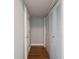 Hallway with a set of storage lockers on the right at 7611 Penguin Cir, Indianapolis, IN 46239