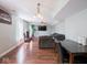 Spacious living room featuring a fireplace, ceiling fan, and hardwood floors, perfect for entertaining at 7611 Penguin Cir, Indianapolis, IN 46239