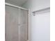 Bathroom features a sliding glass shower door and a wall-mounted towel rack at 7611 Penguin Cir, Indianapolis, IN 46239