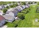 An aerial view of a neighborhood with well-maintained lawns and a community feel at 8141 Maple Stream Ln, Indianapolis, IN 46217