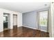 Bedroom featuring hardwood floors and ensuite bathroom and closet at 8141 Maple Stream Ln, Indianapolis, IN 46217