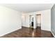 Bedroom with hardwood floors and access to the bathroom and closet at 8141 Maple Stream Ln, Indianapolis, IN 46217