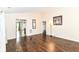 Hardwood floors and neutral walls create a bright, open living space, great for entertaining at 8141 Maple Stream Ln, Indianapolis, IN 46217