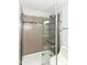 Bathroom featuring a clear glass enclosed shower with updated fixtures at 8141 Maple Stream Ln, Indianapolis, IN 46217