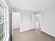 Comfortable bedroom with plush carpet and natural lighting, showcasing a closet at 8146 Whitaker Valley Blvd, Indianapolis, IN 46237