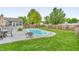Backyard features a sparkling pool, outdoor seating, and lush greenery for outdoor enjoyment at 8375 Eagles Nest Dr, Avon, IN 46123