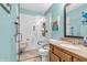 Accessible bathroom with an open walk-in shower, grab bars, and a granite vanity at 8375 Eagles Nest Dr, Avon, IN 46123