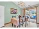 Charming dining room with natural light and sliding glass doors leading to the outside patio at 8375 Eagles Nest Dr, Avon, IN 46123