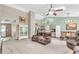 Open-concept living space with kitchen, dining, and comfortable seating at 8375 Eagles Nest Dr, Avon, IN 46123
