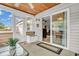Relaxing sunroom with sliding glass doors, perfect for enjoying the outdoors while staying comfortable at 8375 Eagles Nest Dr, Avon, IN 46123