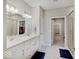 Bathroom with double vanity, modern fixtures, and a glass-enclosed shower at 8593 Hudson Way, Brownsburg, IN 46112