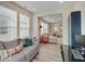 Cozy living room, featuring natural light, neutral tones, and seamless access to the kitchen and study at 8593 Hudson Way, Brownsburg, IN 46112