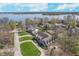 Picturesque aerial view of a home and its location near a serene lake at 9719 Decatur Dr, Indianapolis, IN 46256
