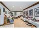 Unfinished basement with a neutral colored carpet, base trim, and drop ceiling at 9719 Decatur Dr, Indianapolis, IN 46256