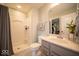 Bright bathroom featuring single sink vanity, toilet, shower with tub, and a tiled floor at 9949 Stable Stone Ter, Fishers, IN 46040