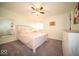 This bedroom offers comfortable carpet, a window, and a mirrored dressing area for an easy ready-for-the-day space at 9949 Stable Stone Ter, Fishers, IN 46040