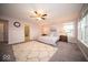 This relaxing bedroom features plush carpet, natural light and a ensuite bathroom with a glass walk in shower at 9949 Stable Stone Ter, Fishers, IN 46040