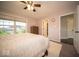 This comfortable main bedroom features neutral wall paint and a connecting door to a walk-in closet at 9949 Stable Stone Ter, Fishers, IN 46040